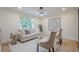 Upstairs living room featuring neutral decor, stylish seating, and lots of natural light at 2825 Shea Sw Way, Marietta, GA 30060