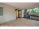 Covered patio with serene backyard views, perfect for relaxing and entertaining at 2825 Shea Sw Way, Marietta, GA 30060
