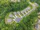 An aerial view of well manicured homes nestled within a lush, green, tree filled neighborhood at 340 Louise Ln, Canton, GA 30114
