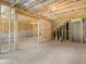 Unfinished basement framed, with open ceiling at 340 Louise Ln, Canton, GA 30114