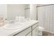 This bathroom features dual vanities, modern countertops, and a striped shower curtain at 340 Louise Ln, Canton, GA 30114