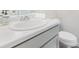 Clean and bright bathroom with sink, countertop, and toilet at 340 Louise Ln, Canton, GA 30114