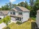 Beautiful two-story home showcasing manicured landscaping and a side-entry garage at 340 Louise Ln, Canton, GA 30114