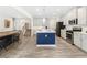 Open concept kitchen featuring center island, stainless steel appliances and hard surface countertops at 340 Louise Ln, Canton, GA 30114