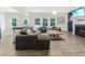 Inviting living room with fireplace, TV, comfortable seating, and lots of natural light at 340 Louise Ln, Canton, GA 30114
