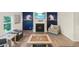Comfortable living room with stylish blue accent walls, fireplace, and ample seating at 340 Louise Ln, Canton, GA 30114