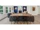 Entertain in style with this rustic-themed living space with unique table and comfortable seating at 340 Louise Ln, Canton, GA 30114