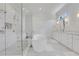 Elegant bathroom featuring a modern tub, glass shower, and marble accents at 4250 Summit Dr, Marietta, GA 30068