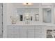 Bright bathroom vanity with white countertop, plenty of storage, and makeup area at 4250 Summit Dr, Marietta, GA 30068