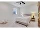 Comfortable bedroom with neutral tones, plush carpeting, and ample natural light at 4250 Summit Dr, Marietta, GA 30068