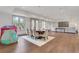 Expansive room with dining table and media area; ideal for Gathering gatherings at 4250 Summit Dr, Marietta, GA 30068