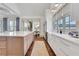 Modern kitchen with white countertops, a center island, stainless steel appliances, and hardwood floors at 4250 Summit Dr, Marietta, GA 30068