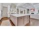 Open-concept kitchen with a large island, perfect for entertaining, flowing seamlessly into the living area at 4250 Summit Dr, Marietta, GA 30068