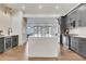 Gourmet kitchen featuring a large island, stainless steel appliances, and modern cabinetry at 4250 Summit Dr, Marietta, GA 30068