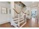 Staircase featuring wooden steps and white railings, leading to an upper level at 4250 Summit Dr, Marietta, GA 30068