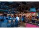 A popular bar scene with lots of patrons seated at tables and standing around the bar and bar area at 1174 Princess Sw Ave, Atlanta, GA 30310