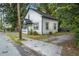 Charming two-story home with a well-maintained lawn and ample parking space at 1174 Princess Sw Ave, Atlanta, GA 30310