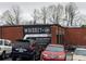 Whiskey tasting venue with brick building, clear signage, and visible cars in the parking lot at 1174 Princess Sw Ave, Atlanta, GA 30310