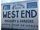 Exterior wall with a mural promoting Wild Heaven Beer, Brewery, and Gardens at 1174 Princess Sw Ave, Atlanta, GA 30310