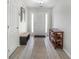 Bright foyer with light-colored flooring and a view of the front door at 3589 Garden Manor Dr, Loganville, GA 30052
