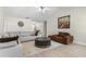 Bright living room featuring modern furniture, vaulted ceiling, and stylish decor at 3589 Garden Manor Dr, Loganville, GA 30052