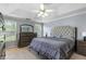 Large main bedroom with trey ceiling, neutral walls, carpeted floor, and bright windows at 3589 Garden Manor Dr, Loganville, GA 30052
