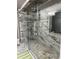 Modern bathroom featuring a frameless glass shower with marble-look tile and decorative accents at 704 Kenton Ct, Locust Grove, GA 30248