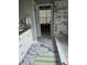 Bright bathroom features marble-look tile floors and a spacious vanity with marble countertops at 704 Kenton Ct, Locust Grove, GA 30248
