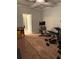 Home gym with an elliptical machine, exercise bike, and workout bench at 704 Kenton Ct, Locust Grove, GA 30248