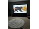 Cozy media room featuring a large flat screen television and shag rug at 704 Kenton Ct, Locust Grove, GA 30248