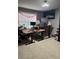 Bright office space with dual adjustable desks and space for productivity at 704 Kenton Ct, Locust Grove, GA 30248