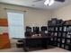 Office with a desk, cabinets, and drawers, next to the window at 704 Kenton Ct, Locust Grove, GA 30248