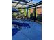 Inviting in-ground pool under a pergola, complemented by patio furniture for relaxation at 704 Kenton Ct, Locust Grove, GA 30248