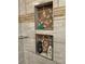 Detailed view of the shower niche with decorative tiles and toiletries at 704 Kenton Ct, Locust Grove, GA 30248