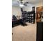 Spacious storage room featuring a desk, shelving, and a walk-in closet at 704 Kenton Ct, Locust Grove, GA 30248
