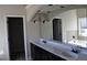 Primary bathroom featuring double vanity, mirror, shower, and tub at 920 Crescent Ridge Dr, Buford, GA 30518