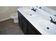 Bathroom featuring double sink vanity, tile floor, and toilet at 920 Crescent Ridge Dr, Buford, GA 30518
