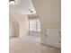 Attic featuring low-pile carpet, a window, and a built in storage area at 203 Crescent Moon Way Way, Canton, GA 30114