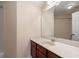 Bathroom with large mirror, vanity, and tiled shower/tub combo at 203 Crescent Moon Way Way, Canton, GA 30114