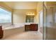 Large primary bathroom with a tub, walk-in shower and lots of vanity space at 203 Crescent Moon Way Way, Canton, GA 30114