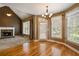 Spacious dining area with hardwood floors, fireplace, and lots of natural light at 203 Crescent Moon Way Way, Canton, GA 30114