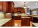 Fully equipped kitchen with modern appliances, granite countertops, and ample cabinet space at 203 Crescent Moon Way Way, Canton, GA 30114