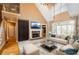 Bright living room with hardwood floors, fireplace, lots of natural light and vaulted ceilings at 203 Crescent Moon Way Way, Canton, GA 30114