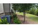 Wide, well-maintained lawn with mature trees and shrubs at 301 Hayden Cir, Woodstock, GA 30189