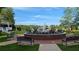 Beautiful fountain in the park featuring flowerbeds, benches, and a gazebo at 301 Hayden Cir, Woodstock, GA 30189