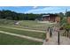 An outdoor amphitheater featuring stone steps and green space at 301 Hayden Cir, Woodstock, GA 30189