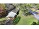 Aerial view of property showing roof, carport and mature trees at 3081 Frankie Ln, Duluth, GA 30096