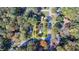 Aerial view featuring a home bordered in yellow in a wooded residential area at 3081 Frankie Ln, Duluth, GA 30096