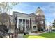 Traditional architecture of the Duluth City Hall building with beautiful landscaping at 3081 Frankie Ln, Duluth, GA 30096