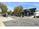 Street view in a commercial area with shops, restaurants, and accessible sidewalks and parking at 3081 Frankie Ln, Duluth, GA 30096